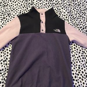 The brained is North Face and the color is pink and gray